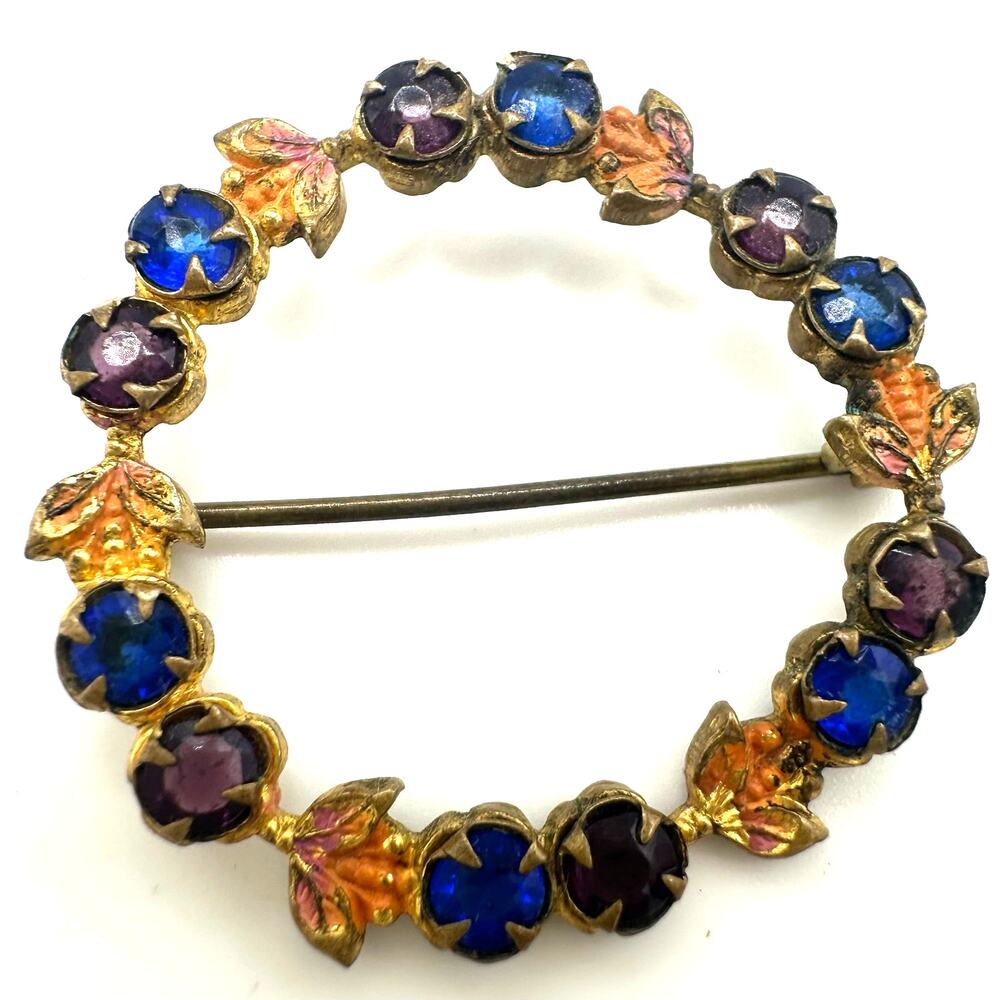 Antique gold tone blue purple Czech glass rhinestones enamel wreath brooch